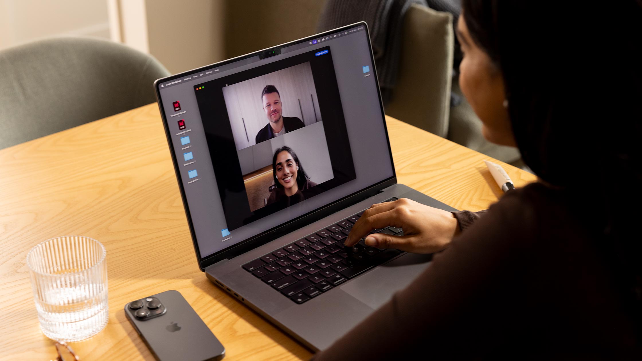 A woman is on a live video call with a man.
